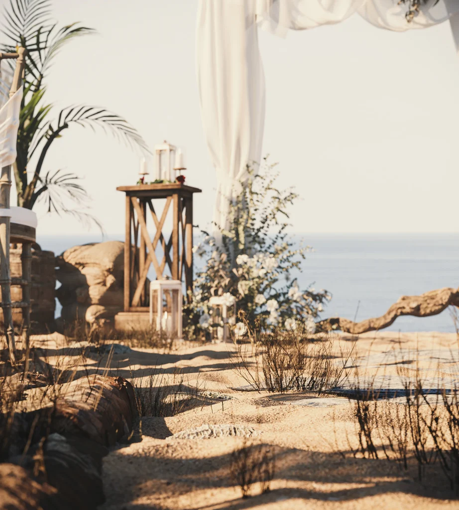 greek wedding in an island with plants and sand